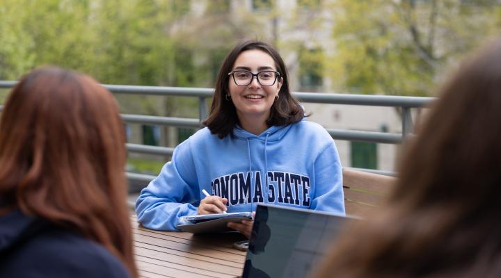 student reading at the student center